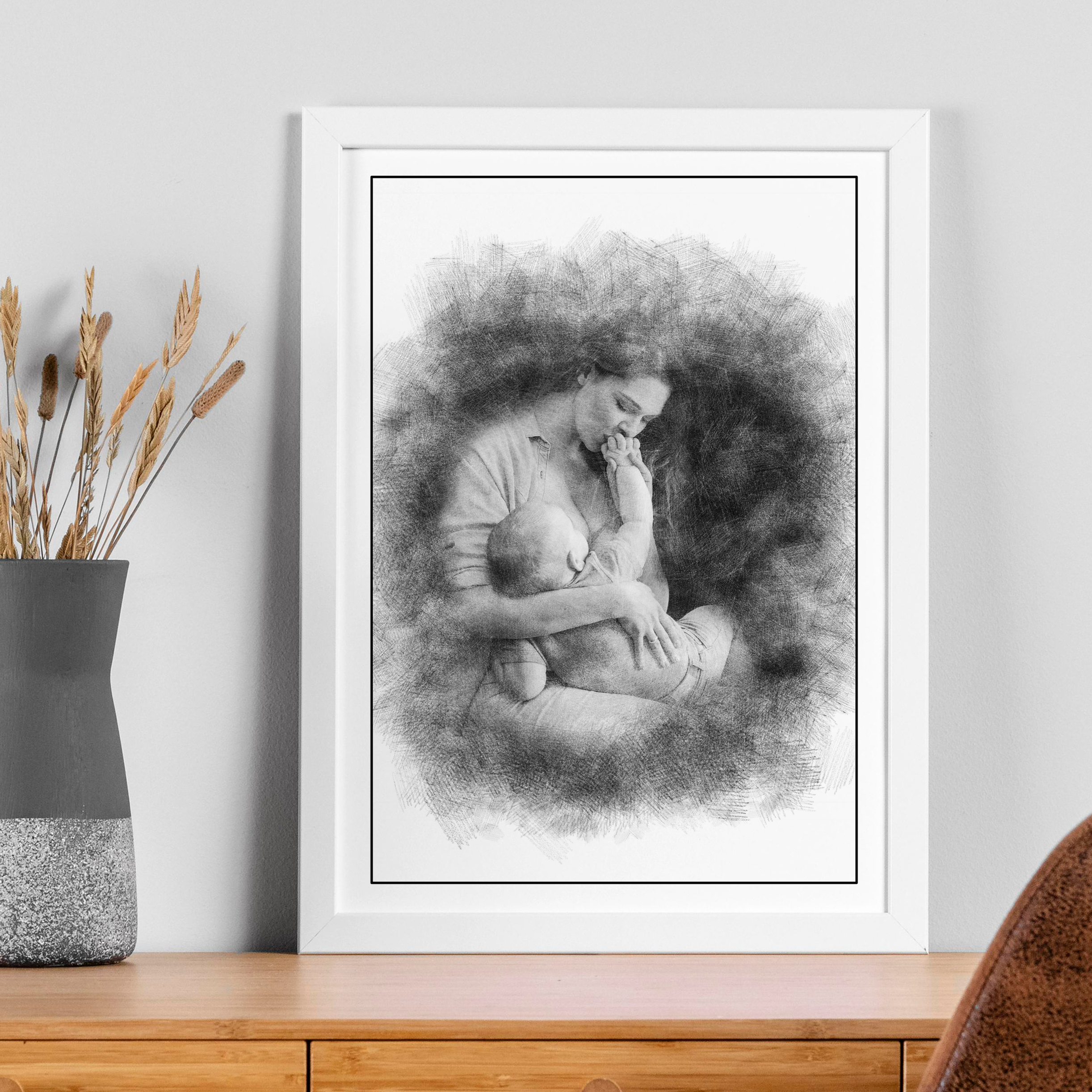 Personalized wall art of a mother and baby portrait in a sketch style
